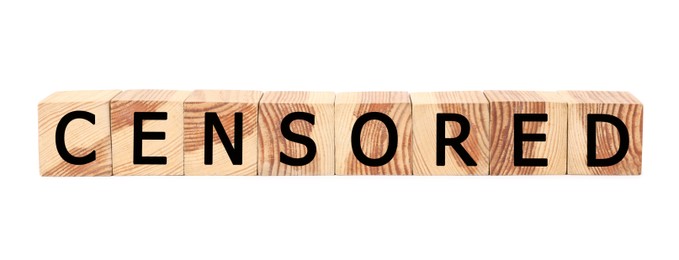 Photo of Wooden cubes with word Censored on white background