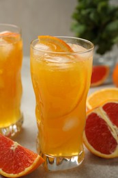 Delicious orange soda water on light table