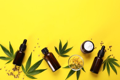 Photo of Flat lay composition with hemp leaves, CBD oil and THC tincture on yellow background, space for text