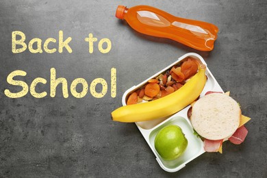 Image of Lunch box with appetizing food bottle of juice on grey background, top view