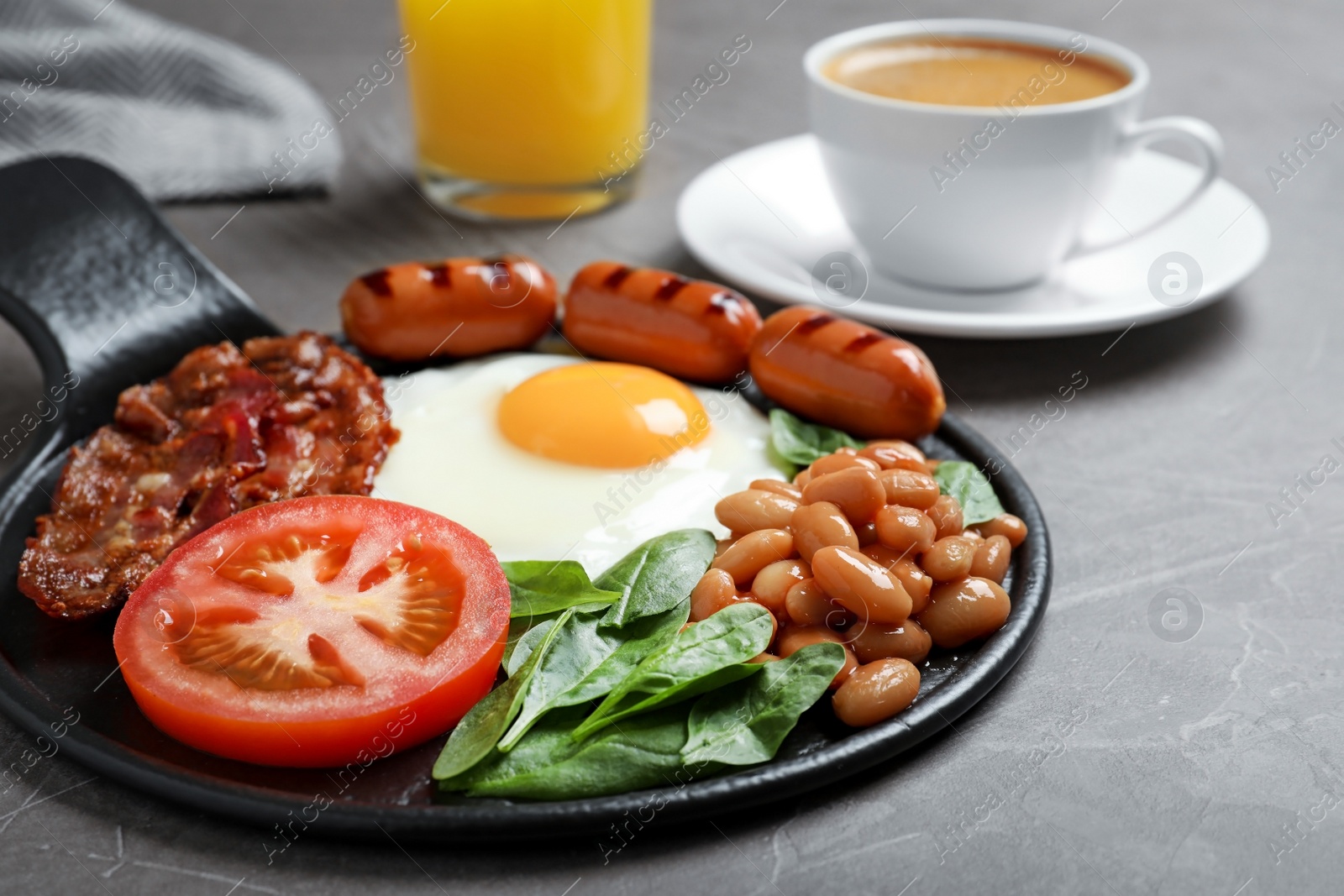 Photo of Delicious breakfast with fried egg served on table