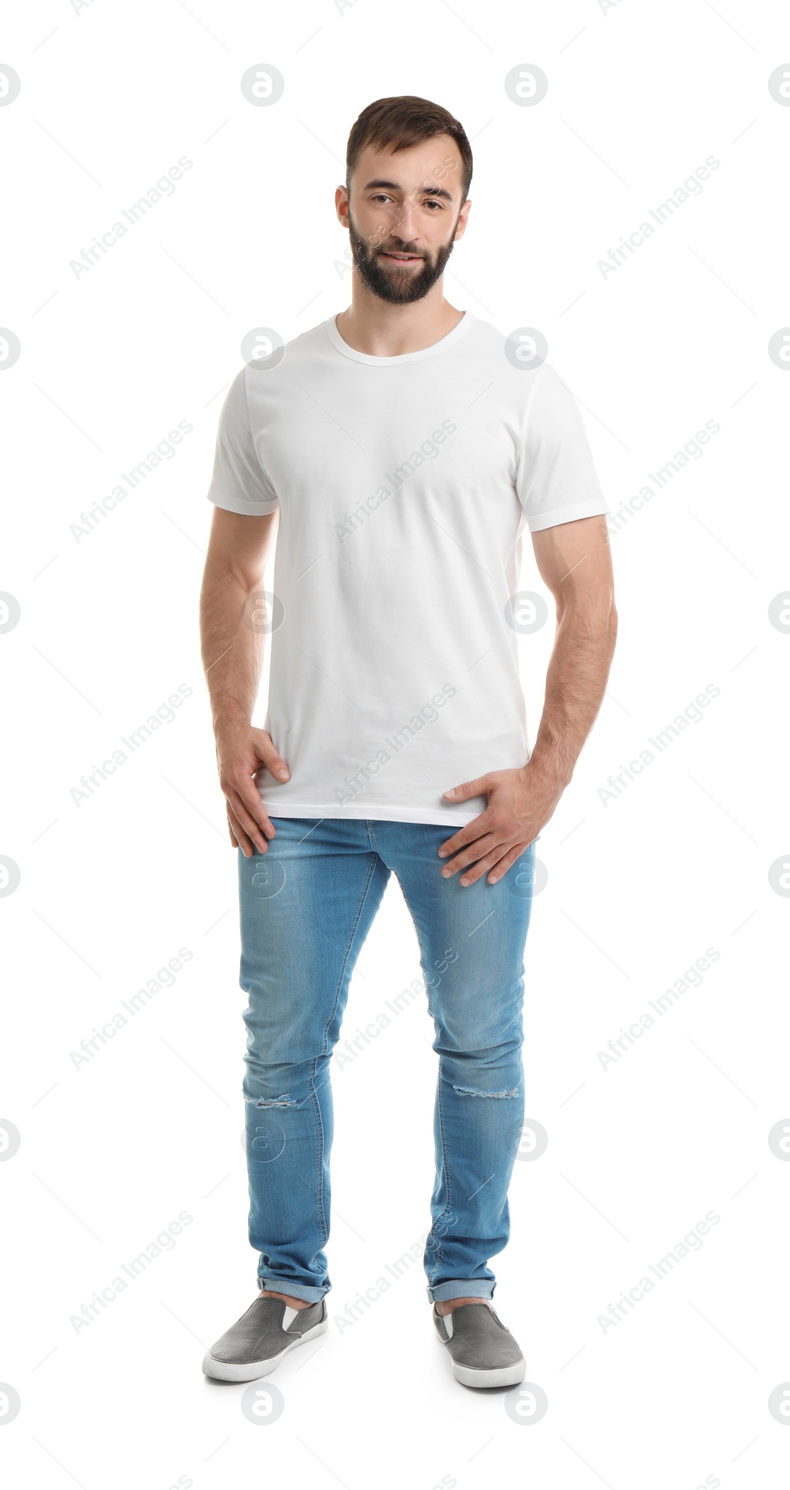 Photo of Young man in t-shirt on white background. Mockup for design