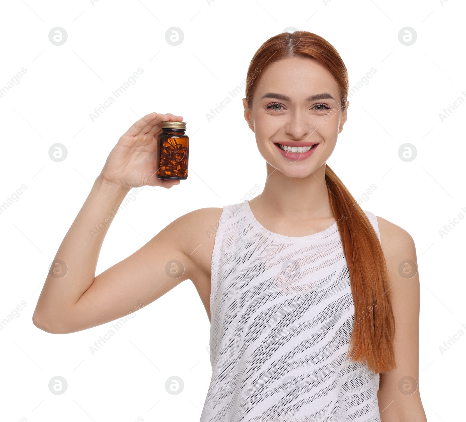 Photo of Happy young woman with bottle of pills on white background. Weight loss