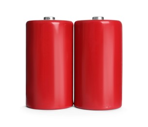 New D batteries on white background. Dry cell