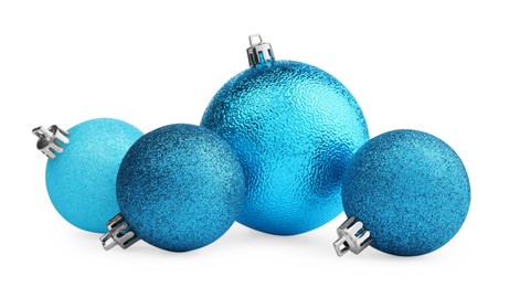 Photo of Beautiful light blue Christmas balls on white background