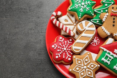 Photo of Tasty homemade Christmas cookies on grey table, top view. Space for text