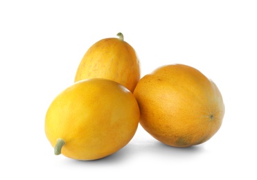 Whole tasty ripe melons on white background