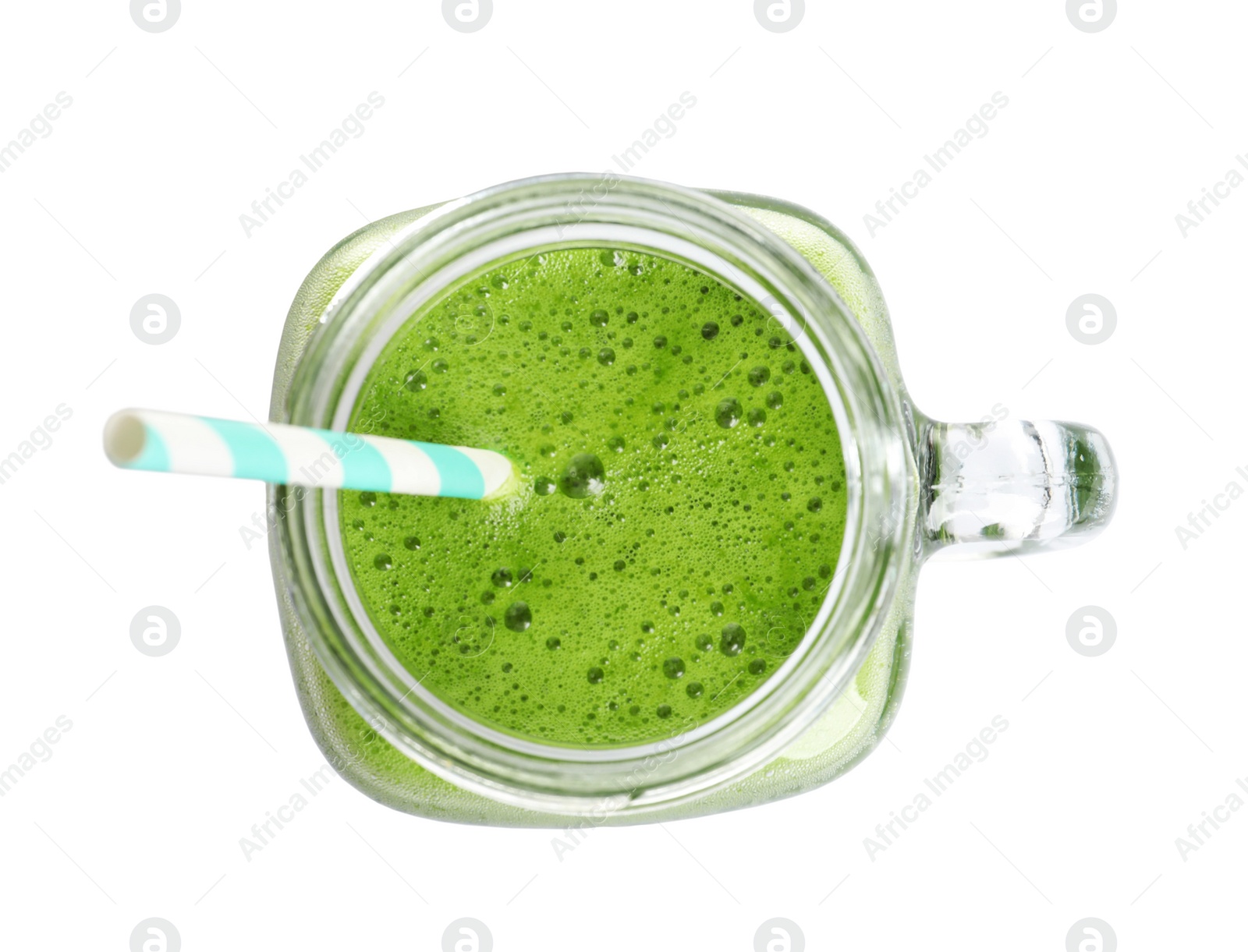 Photo of Mason jar with delicious detox juice on white background, top view