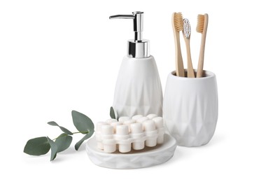 Photo of Bath accessories. Set of different personal care products and eucalyptus leaves isolated on white