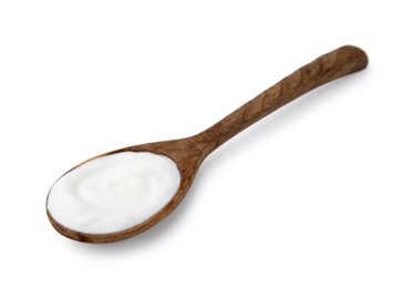 Photo of Delicious natural yogurt in wooden spoon isolated on white