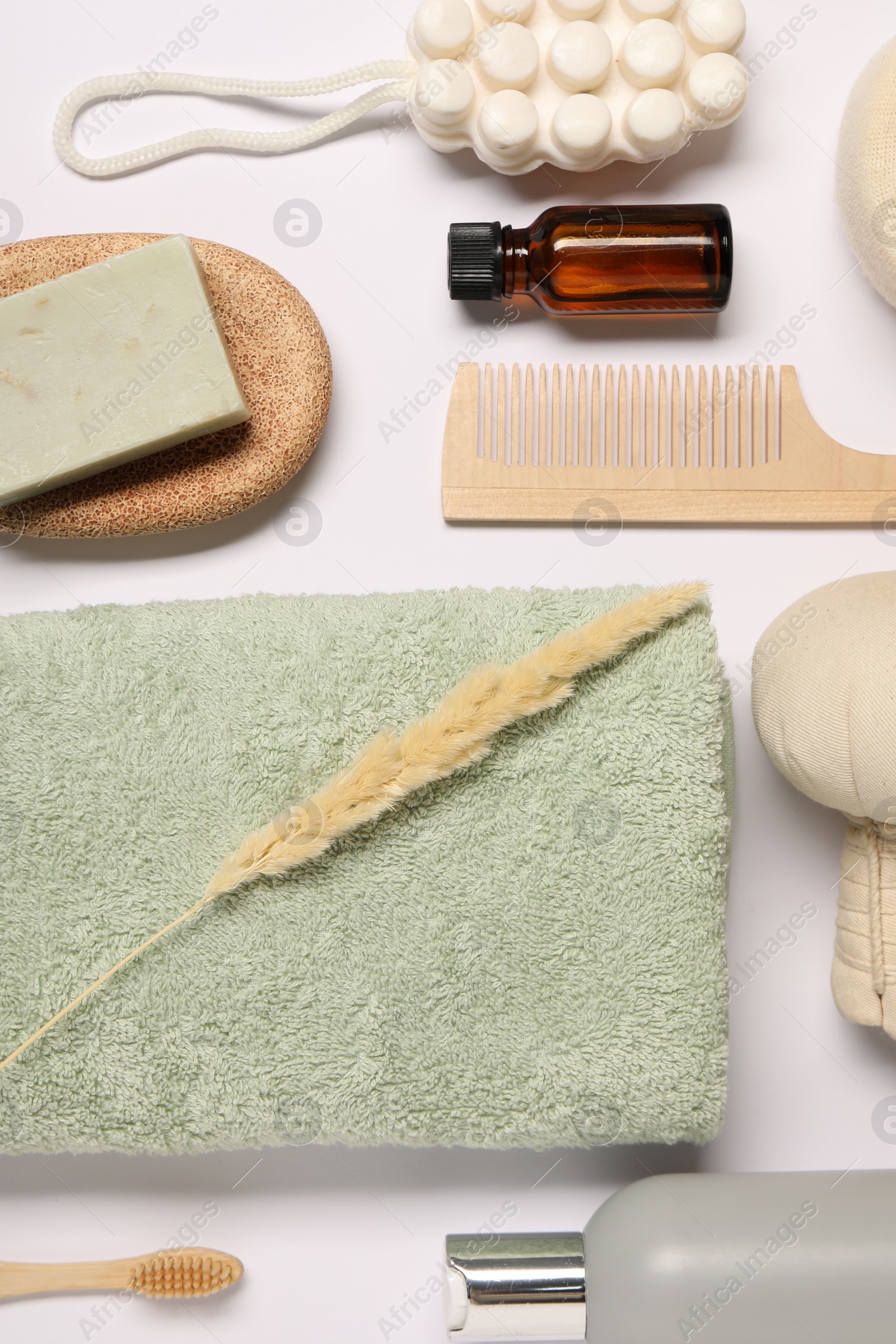 Photo of Bath accessories. Different personal care products and dry spikelet on white background, flat lay