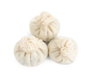 Three tasty khinkali (dumplings) isolated on white, top view. Georgian cuisine