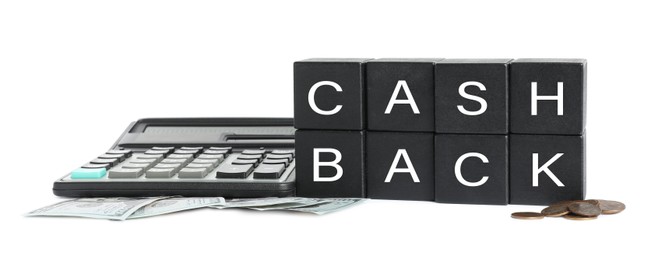 Photo of Black cubes with word Cashback, money and calculator on white background