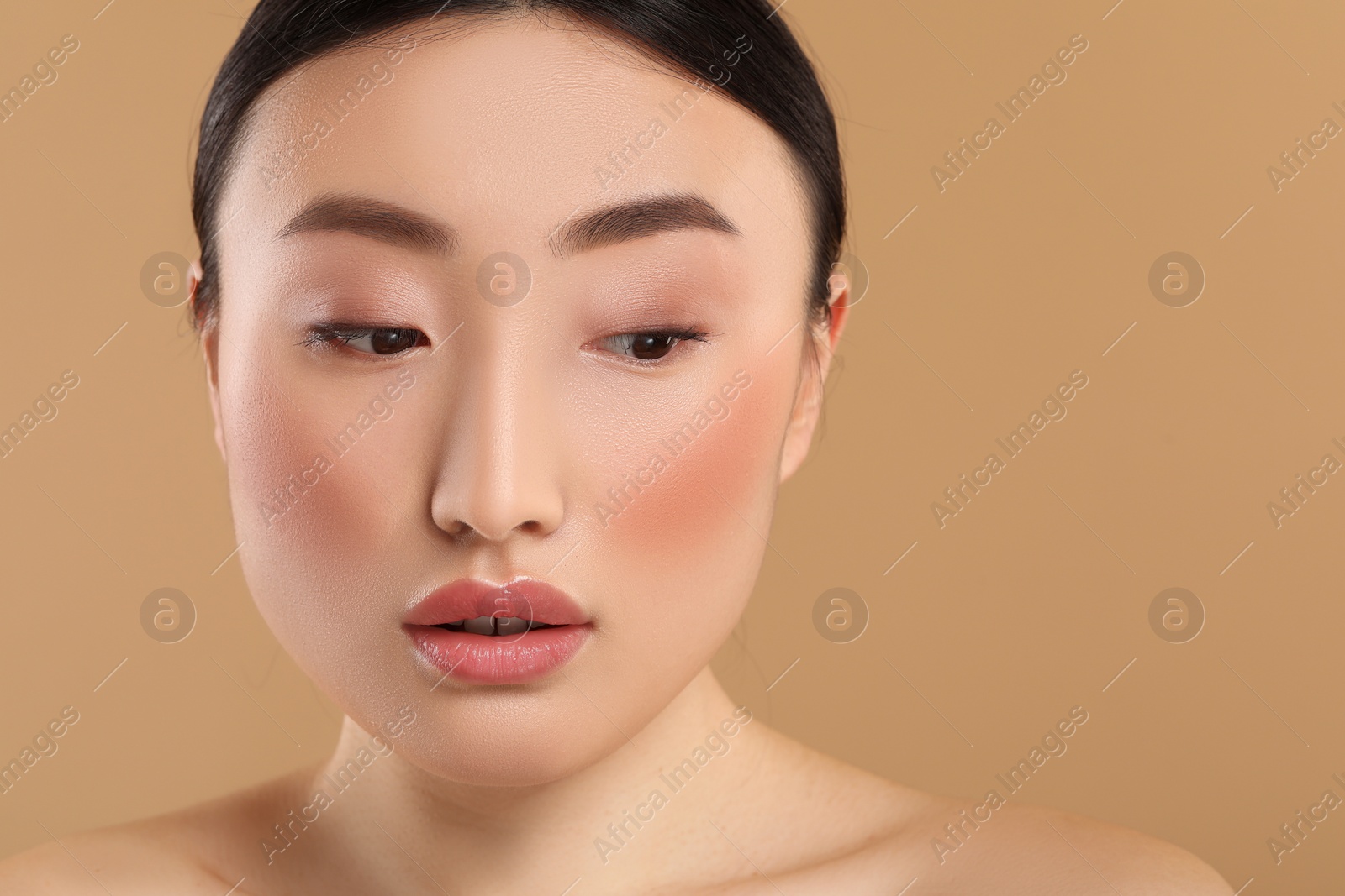 Photo of Beautiful woman with healthy skin on beige background. Space for text