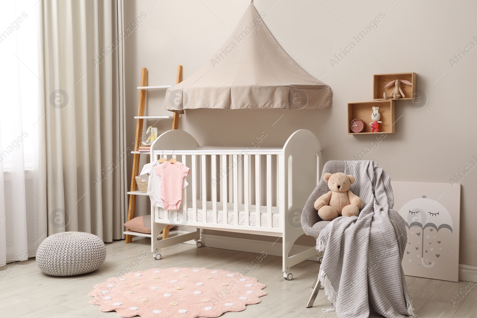 Photo of Modern baby room interior with stylish crib