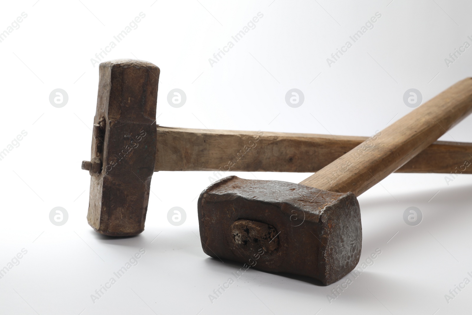 Photo of Two sledgehammers isolated on white. Manual tool