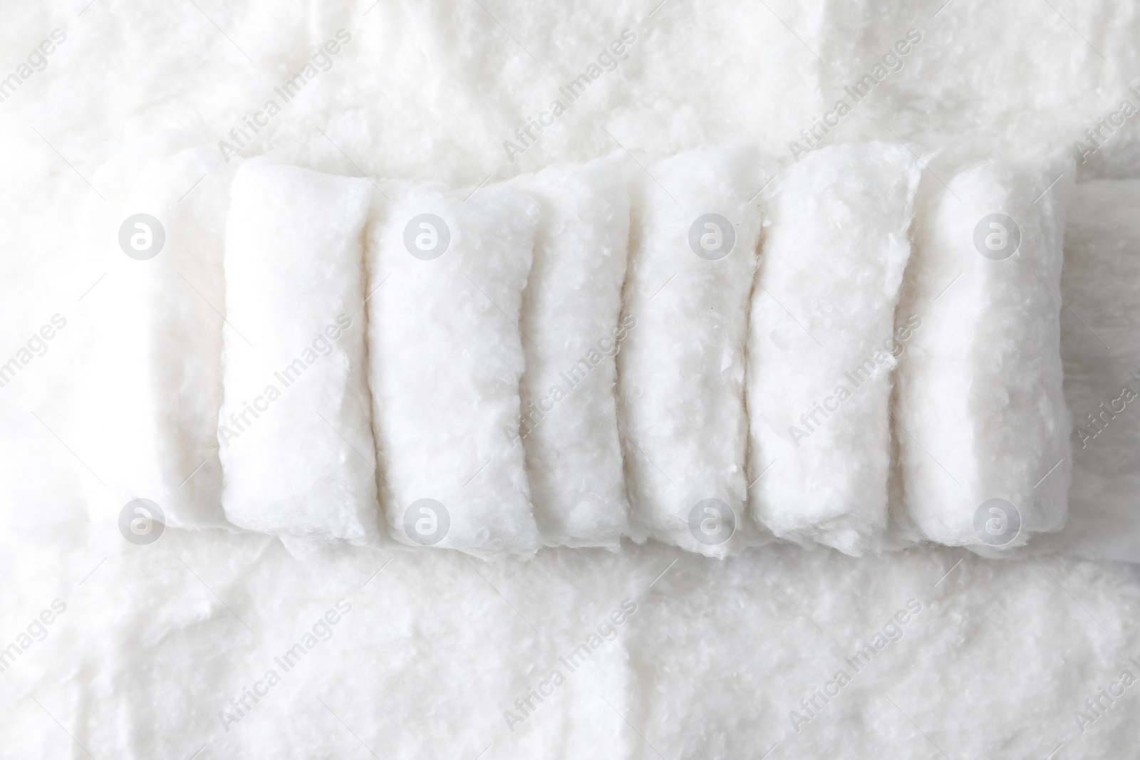 Photo of Soft clean white cotton wool, top view