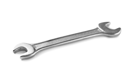 Photo of New wrench on white background. Plumber tools