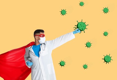 Doctor wearing face mask and superhero costume fighting against viruses on yellow background