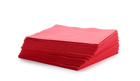 Stack of clean paper napkins on white background