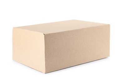 Photo of Closed cardboard box on white background. Mockup for design