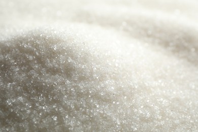 Pile of granulated sugar as background, closeup