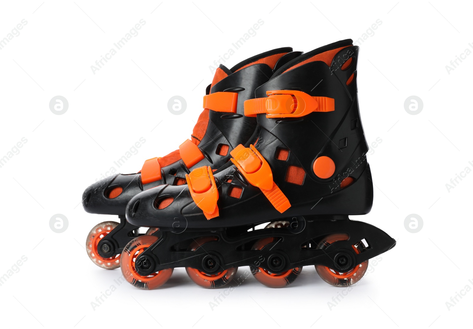 Photo of Pair of inline roller skates on white background