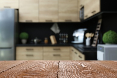 Image of Wooden table in kitchen. Space for design