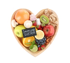 Heart shaped tray with healthy products and text Immune System on white background, top view