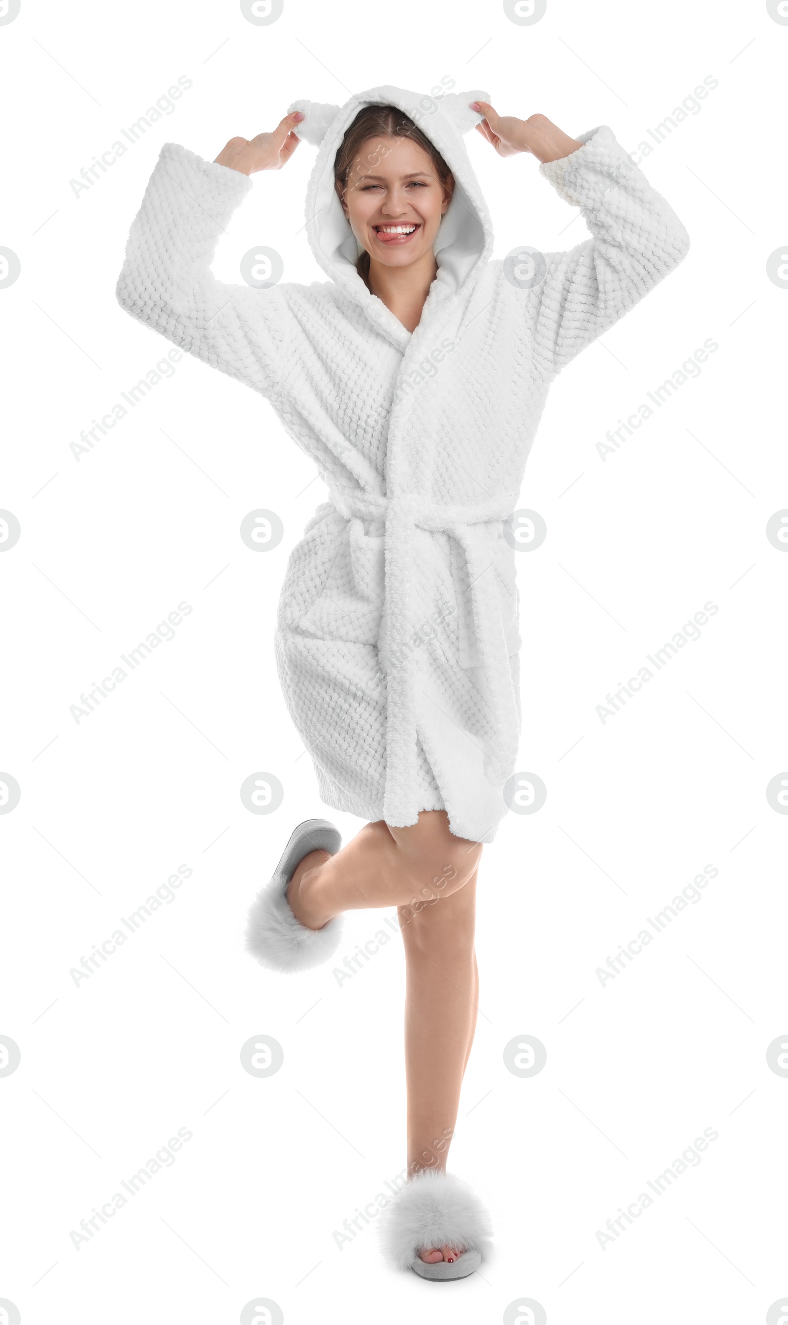 Photo of Young woman in bathrobe on white background