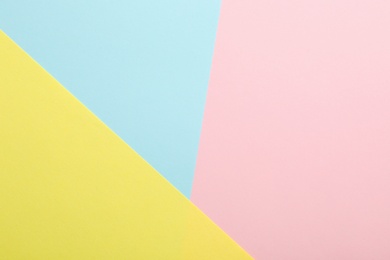 Colorful paper sheets as background, top view