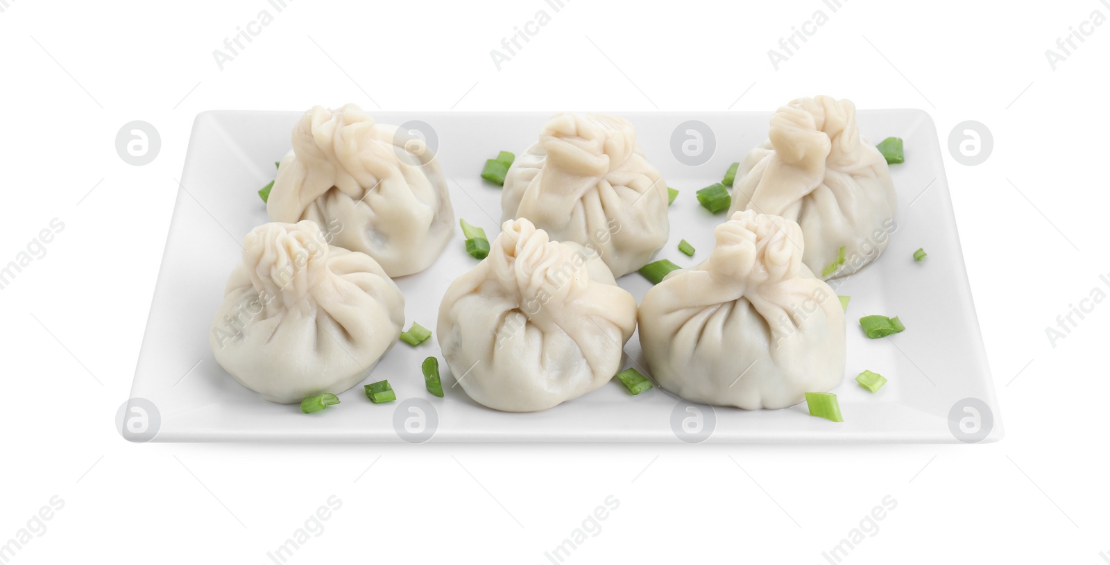 Photo of Plate with tasty fresh khinkali (dumplings) with onion isolated on white, above view. Georgian cuisine