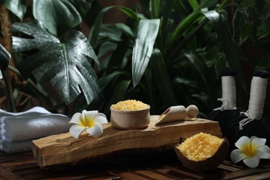 Photo of Spa composition with orange sea salt on wooden table