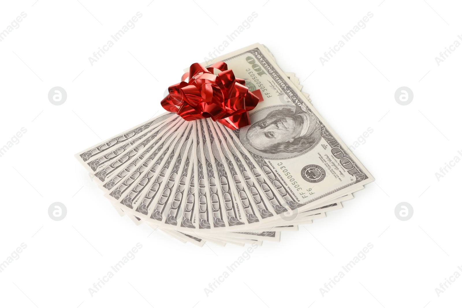 Photo of Fan of dollar banknotes with bow on white background