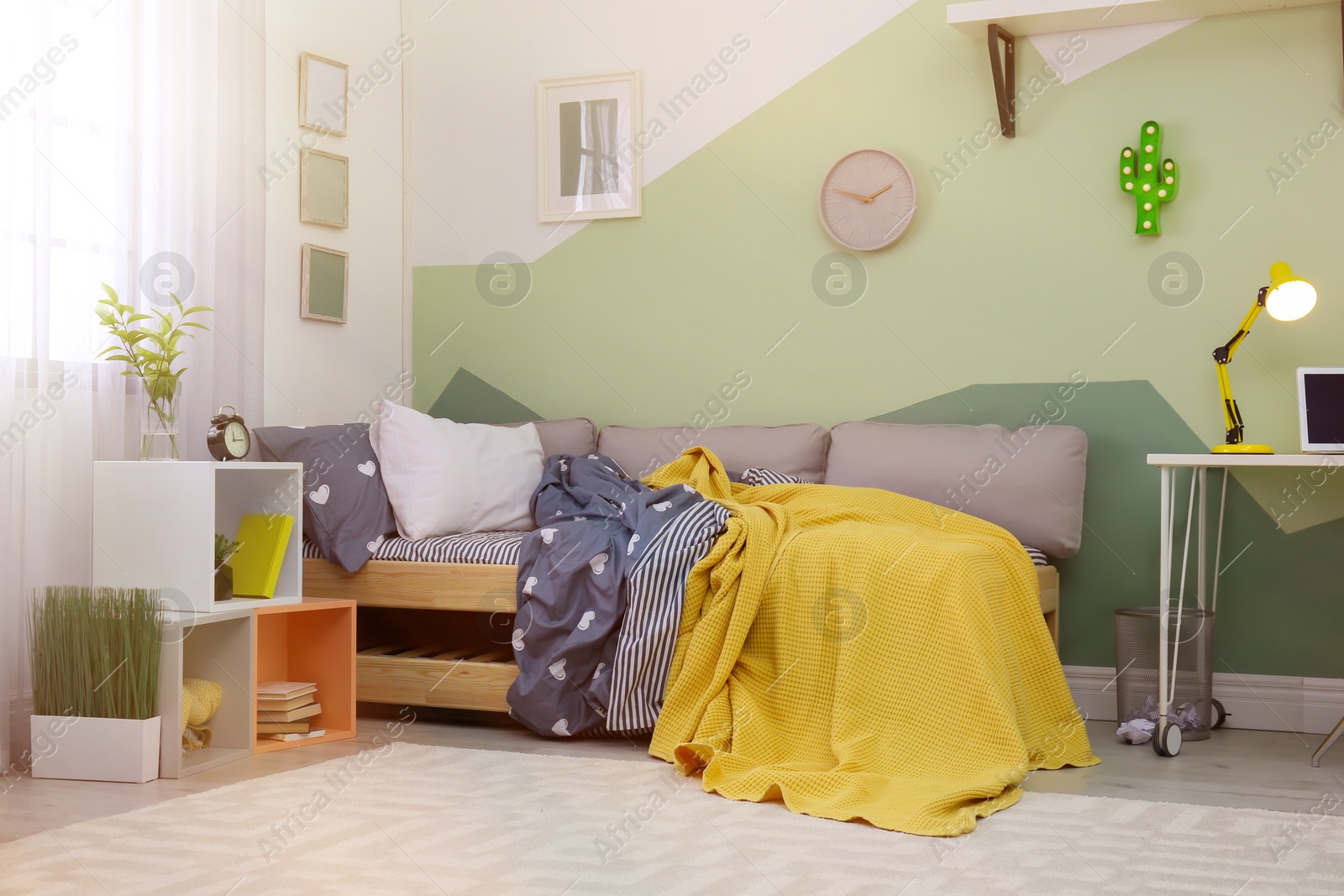 Photo of Modern child room interior with comfortable bed