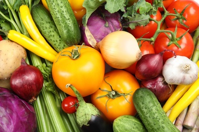 Photo of Many fresh ripe vegetables as background. Organic food