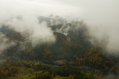 Aerial view of mountains covered with fog