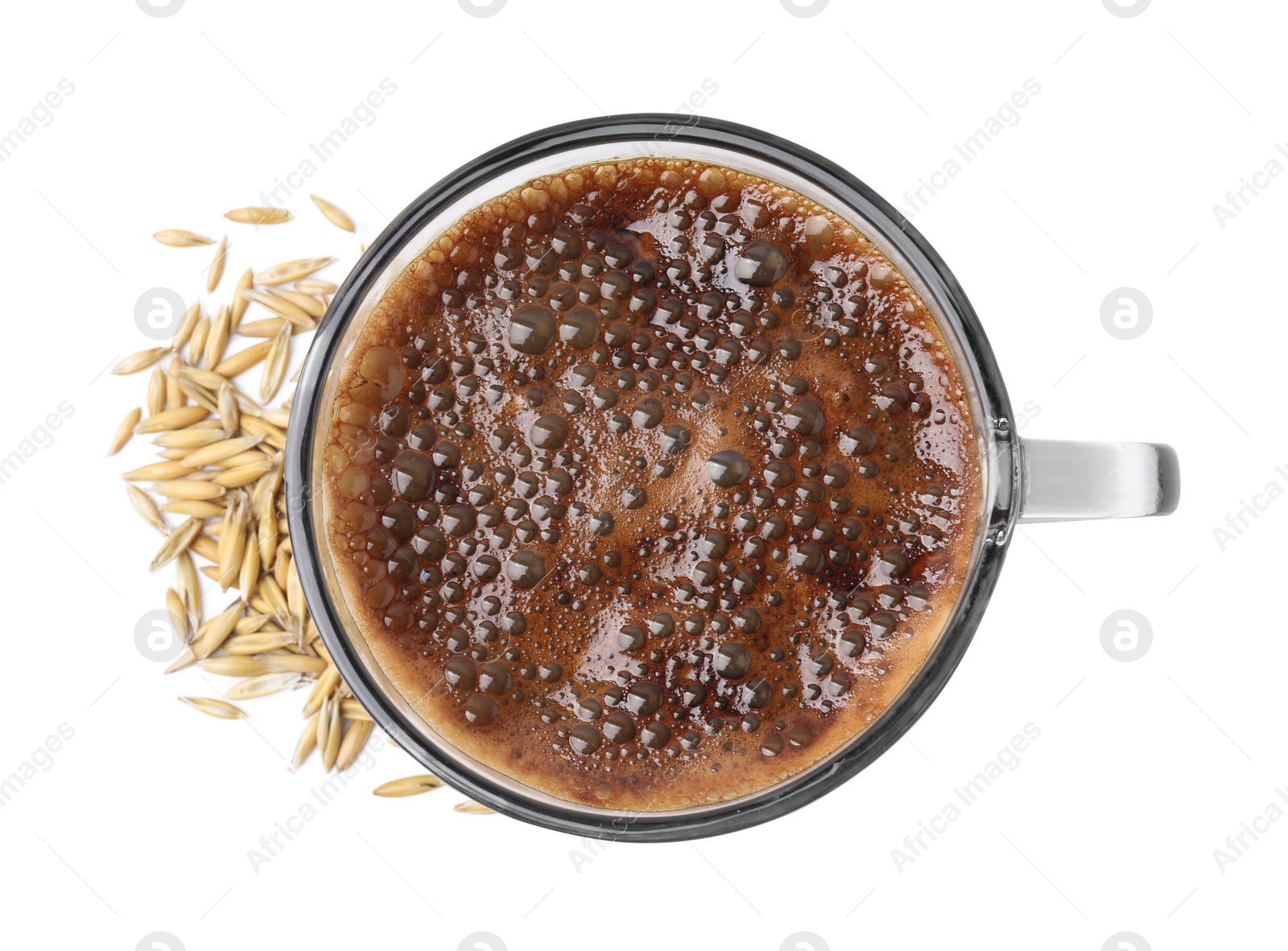 Photo of Cup of barley coffee and grains isolated on white, top view