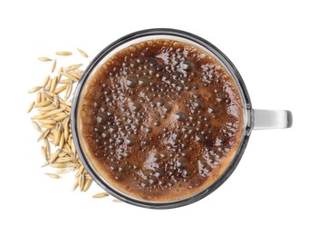 Photo of Cup of barley coffee and grains isolated on white, top view