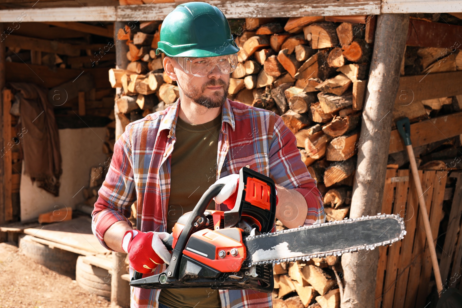 Photo of Man with modern saw on sunny day