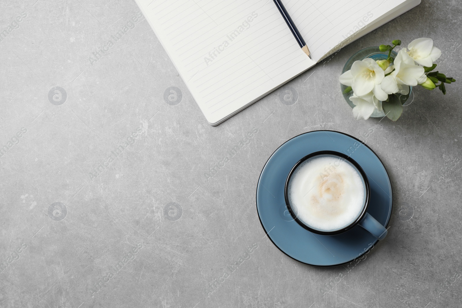 Photo of Flat lay composition with coffee on grey table, space for text. Tasty breakfast