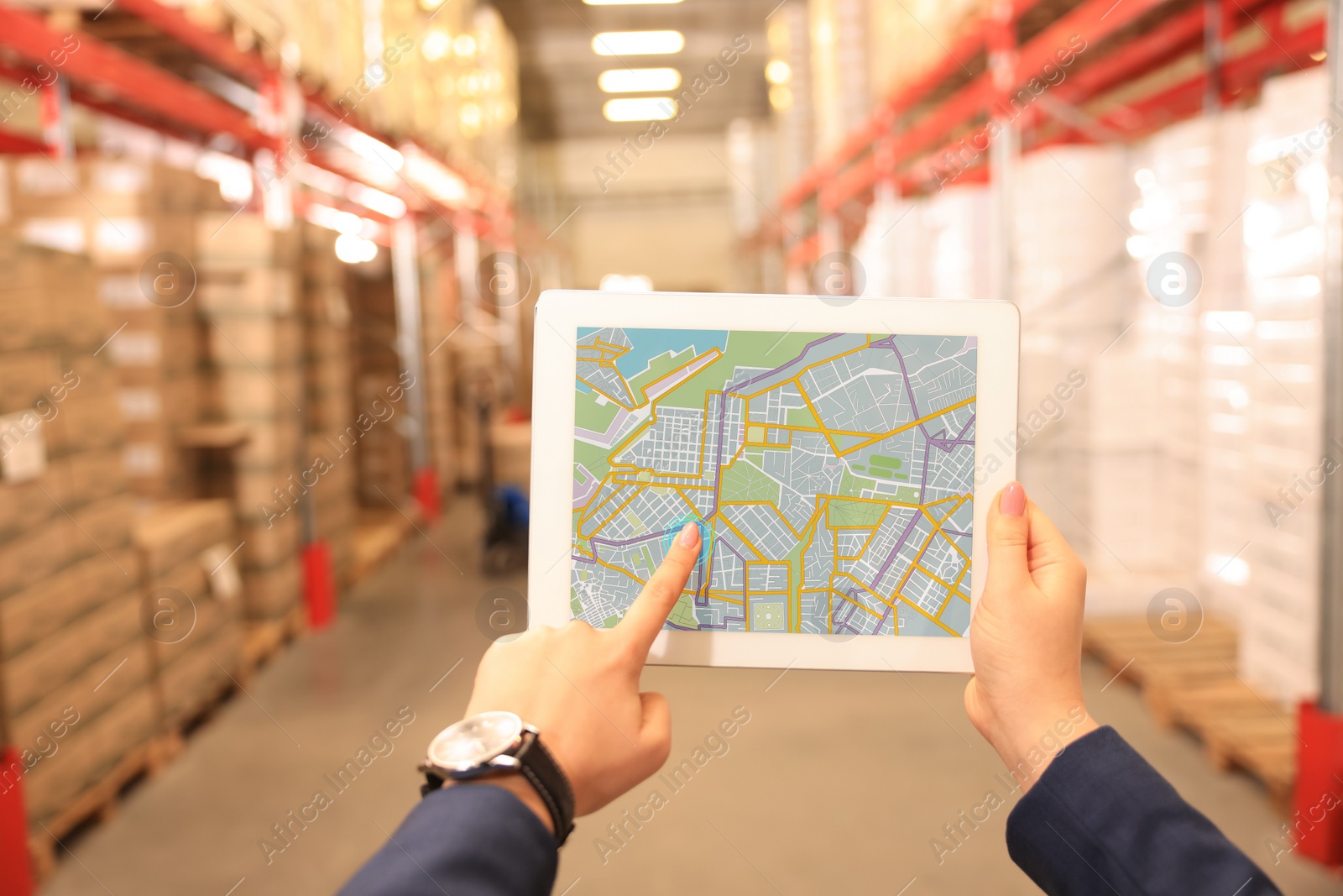 Image of Manager with tablet working at warehouse, closeup. Logistics center
