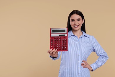 Photo of Smiling accountant with calculator on beige background, space for text