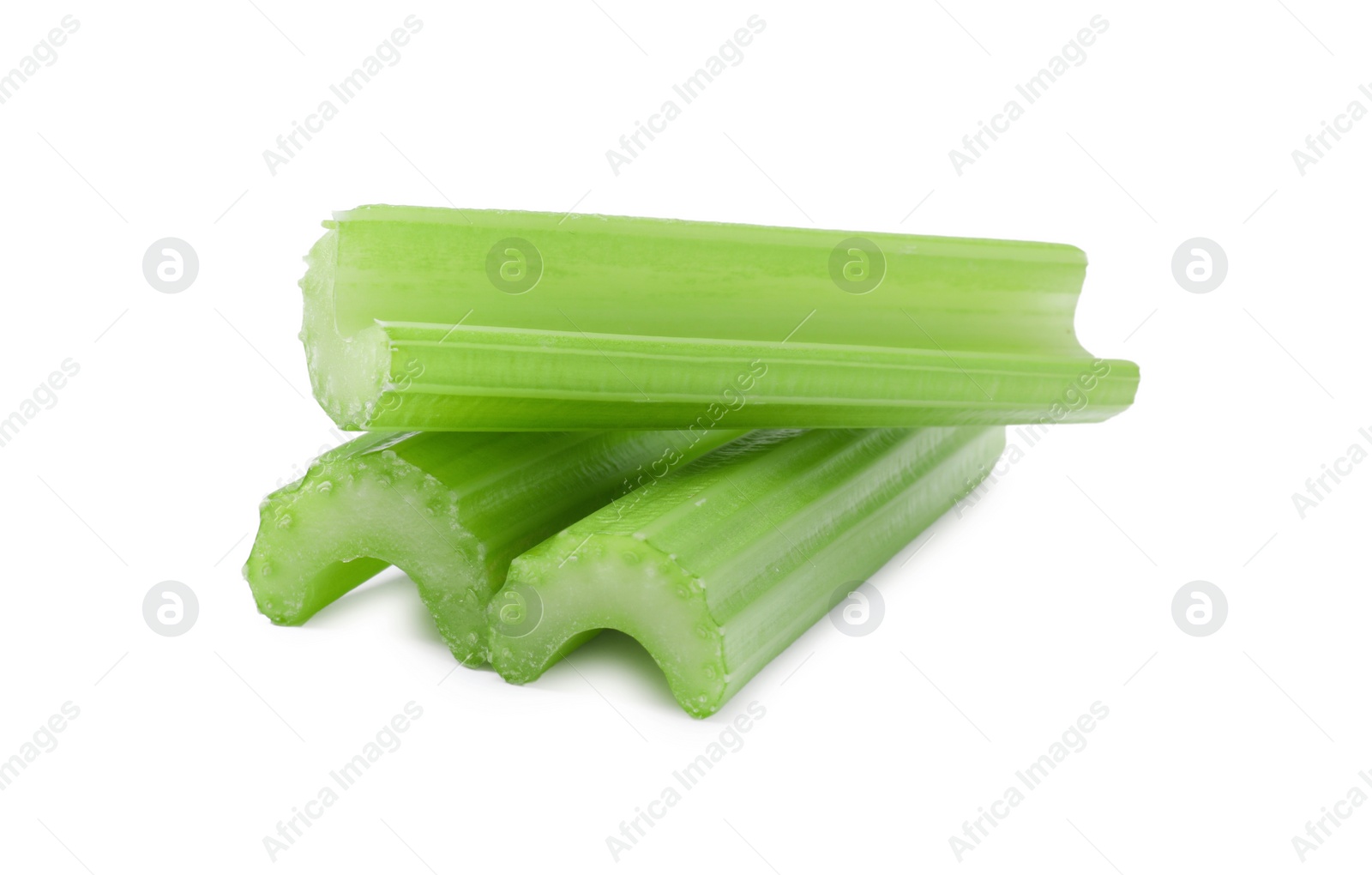 Photo of Fresh green cut celery isolated on white