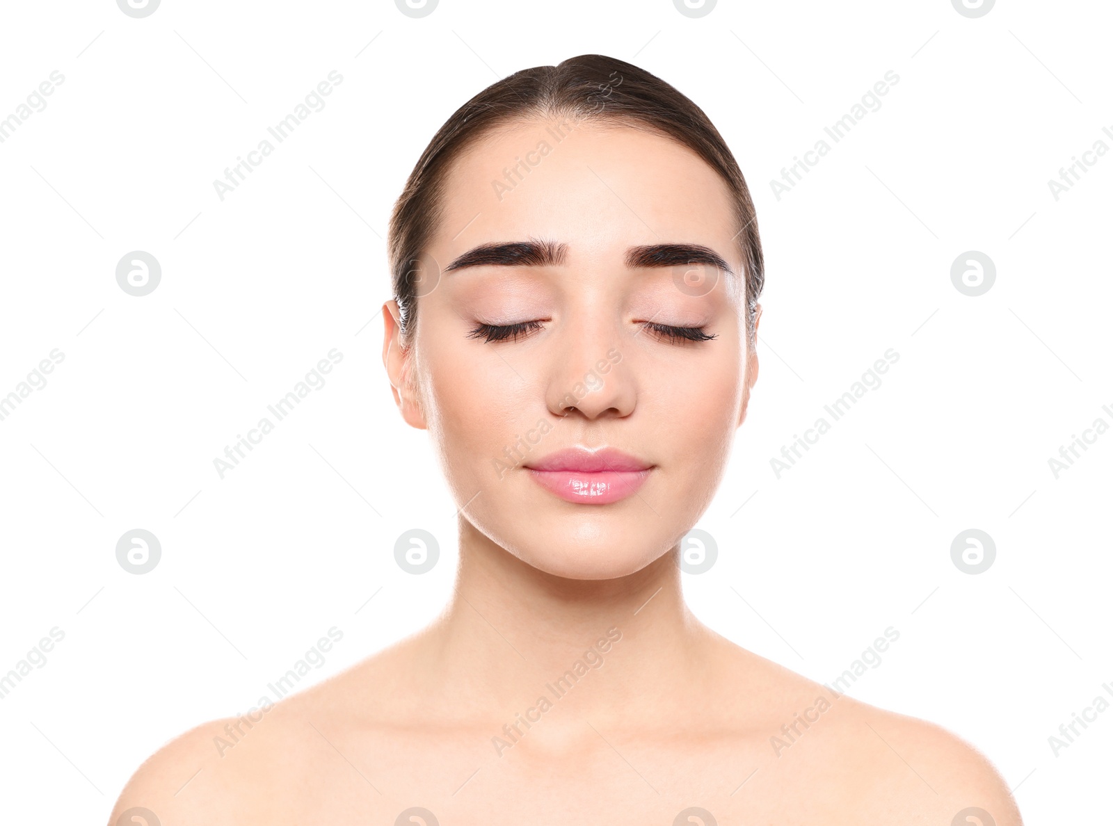 Photo of Portrait of young woman with beautiful face against white background