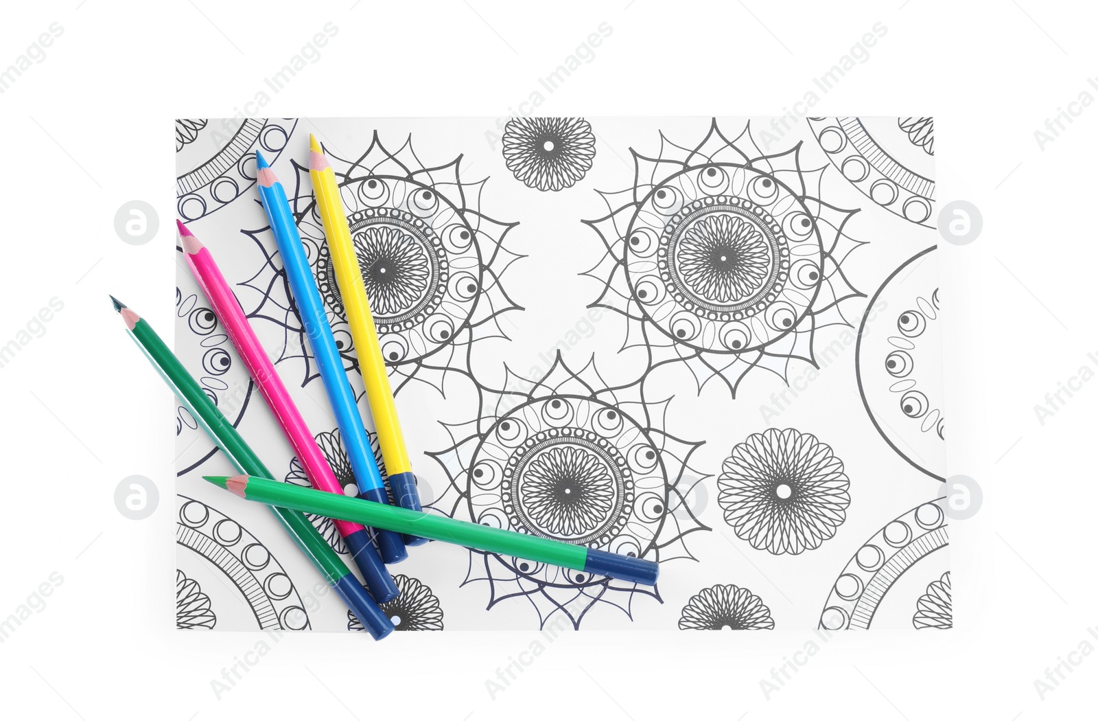 Photo of Antistress coloring page and pencils on white background, top view