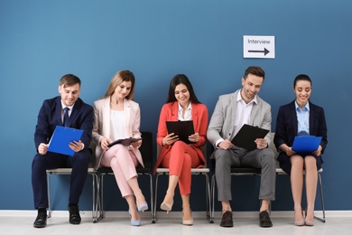 Group of people waiting for job interview, indoors