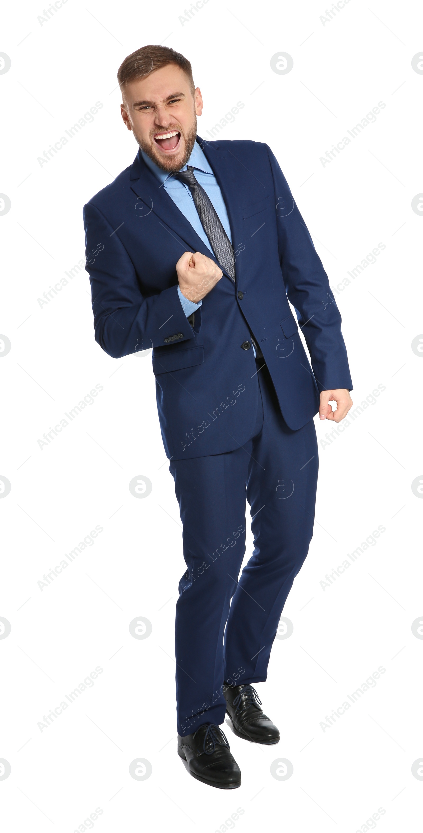 Photo of Young businessman celebrating victory on white background