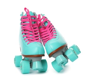 Photo of Pair of bright stylish roller skates on white background