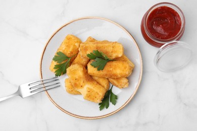 Photo of Plate with tasty fried mozzarella sticks and parsley served with ketchup on white marble table, flat lay